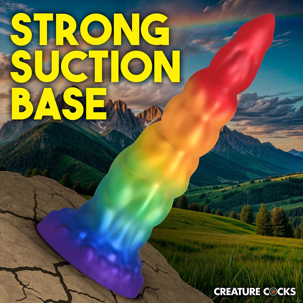 XR Creature Cocks Magic Rider rainbow tapered unicorn horn silicone fantasy dildo  suctioned to a surface to show suction strength