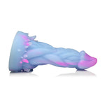 XR Brands Creature Cocks Nomura Jellyfish shaped, pink, purple and blue fantasy silicone dildo horizontal to the ground
