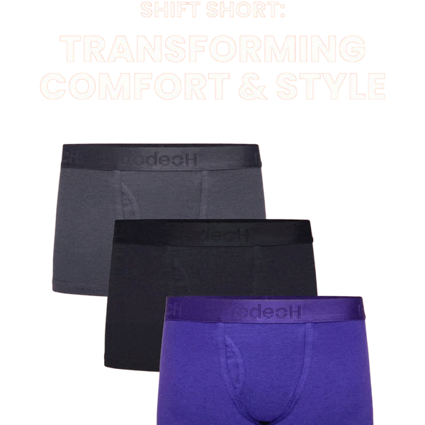 Three boxer brief harnesses stacked, black, grey and purple